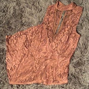 A copper peach dress about knee length in an XS.
